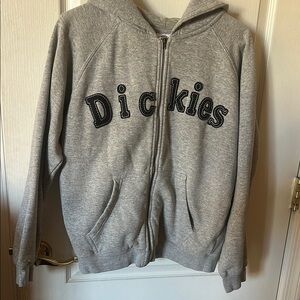 Womens Dickies grey zip up hoodie with black lettering. Size medium.
